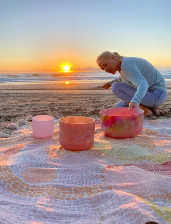 sunrise with beach and sound bowls